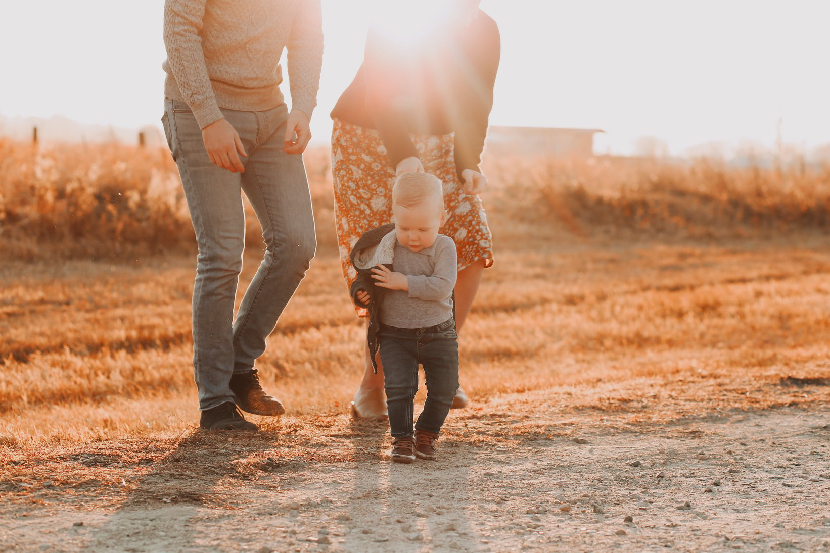 Photo of Toddler Walking on Field